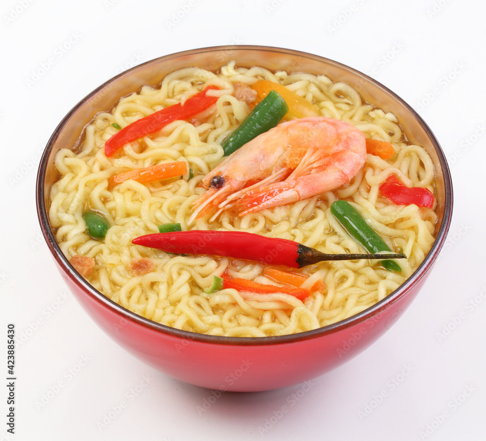 Chinese noodles with vegetables, soy sauce on a white plate Chinese noodles with vegetables, soy sauce on a white plate