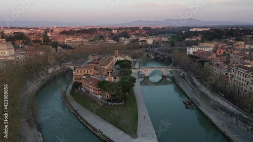 Tiberian Island on the Tiber River in the center of Rome.
Panoramic aerial view at sunset photo