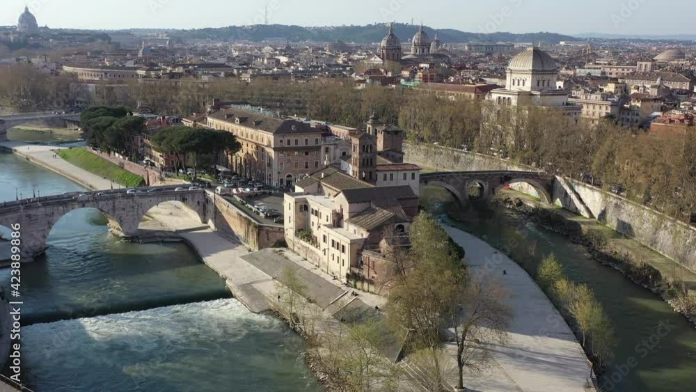 Tiberian Island on the Tiber River in the center of Rome.
Panoramic aerial view at sunset Tiberian Island on the Tiber River in the center of Rome.
Panoramic aerial view at sunset