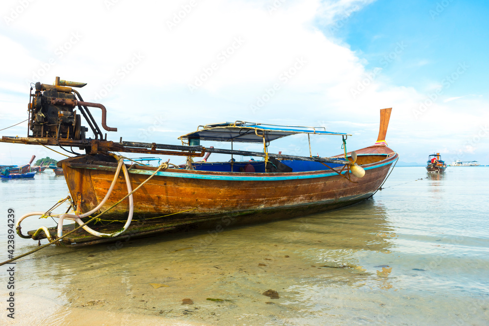 Longtail boats harbor at Ko Lipe island in Satun, Thailand. Longtail boats harbor at Ko Lipe island in Satun, Thailand.