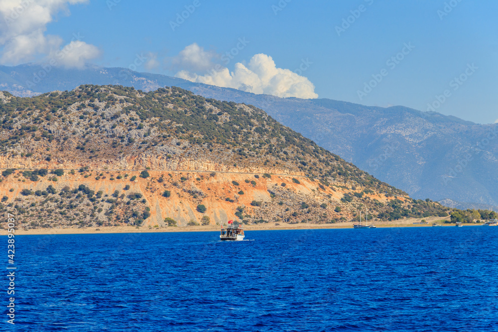 Tourist ship sailing in the Mediterranean sea near Kekova island in Antalya province, Turkey. Turkish Riviera