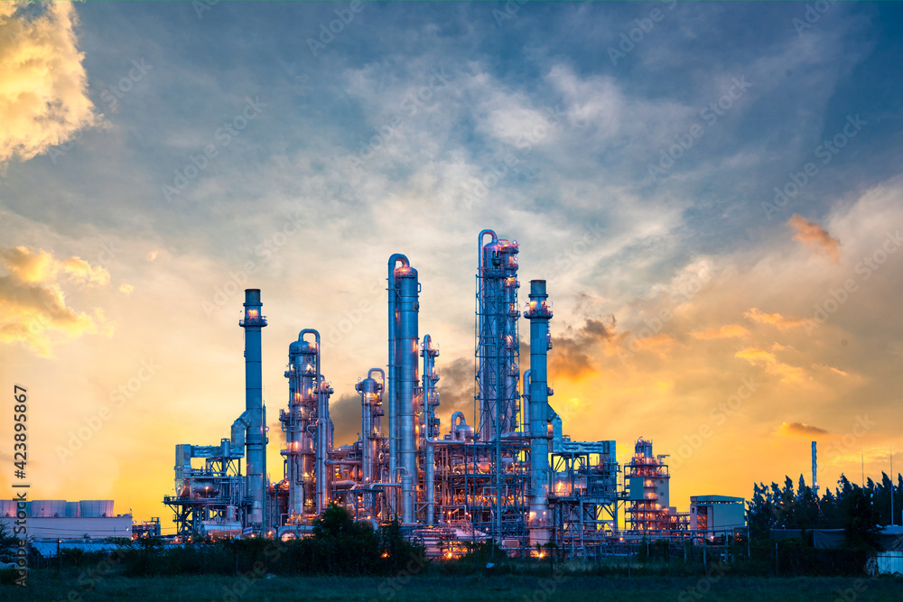 Power plant gas or oil for industry at twilight, Power plant with sunlight Power plant gas or oil for industry at twilight, Power plant with sunlight