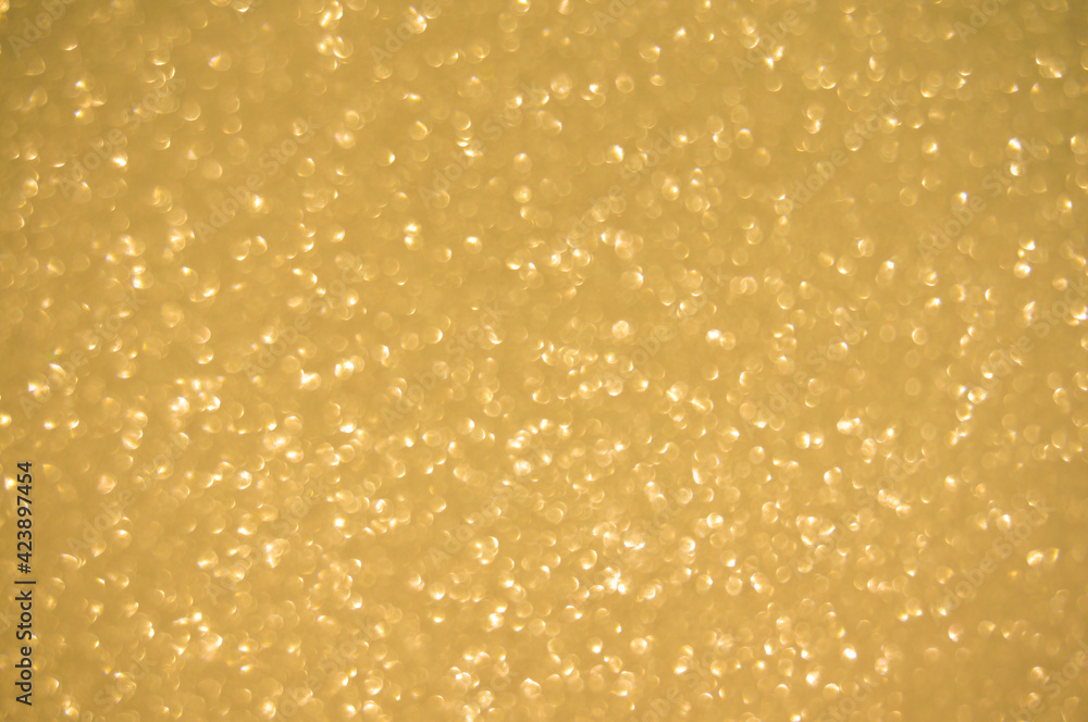 Gold glitters background. shimmering blur spot lights Bokeh Shiny gold light background. Gold glitters background. shimmering blur spot lights Bokeh Shiny gold light background.
