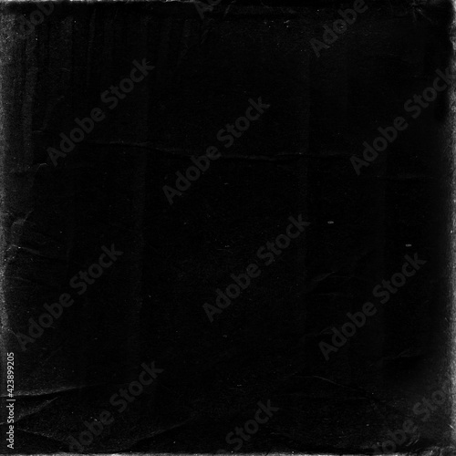 old paper texture in square frame for cover art. grungy frame in black background. can be used to replicate the aged and worn look for your creative design. photo