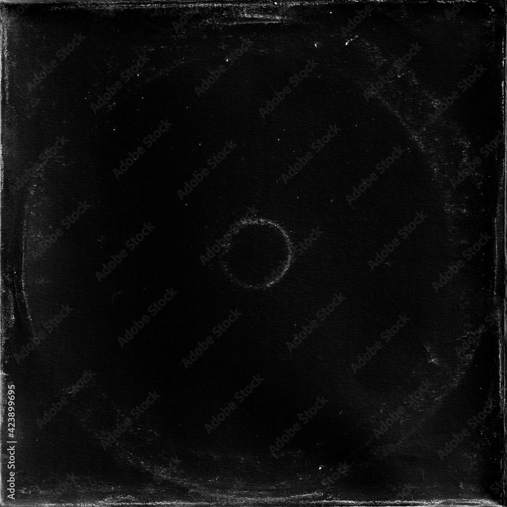 cd mark texture on paper for old cover art. grungy frame in black  background. can be used to replicate the aged and worn look for your  creative design. фотография Stock | Adobe