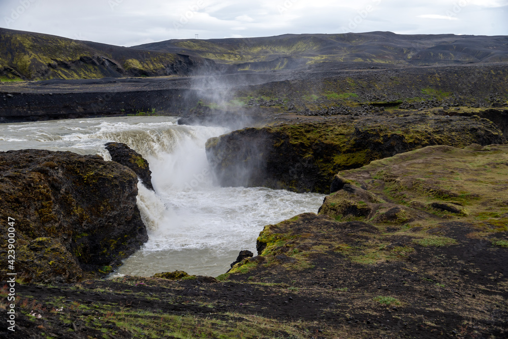Fototapeta premium Hafragilsfoss is the very powerful waterfall on Iceland not far from its bigger brother Dettifoss. 