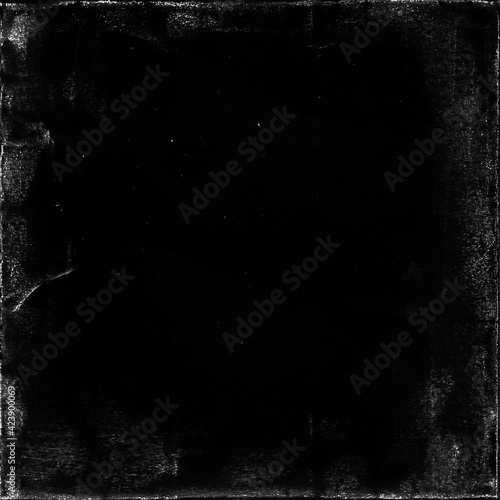 old paper texture in square frame for cover art. grungy frame in black background. can be used to replicate the aged and worn look for your creative design. photo