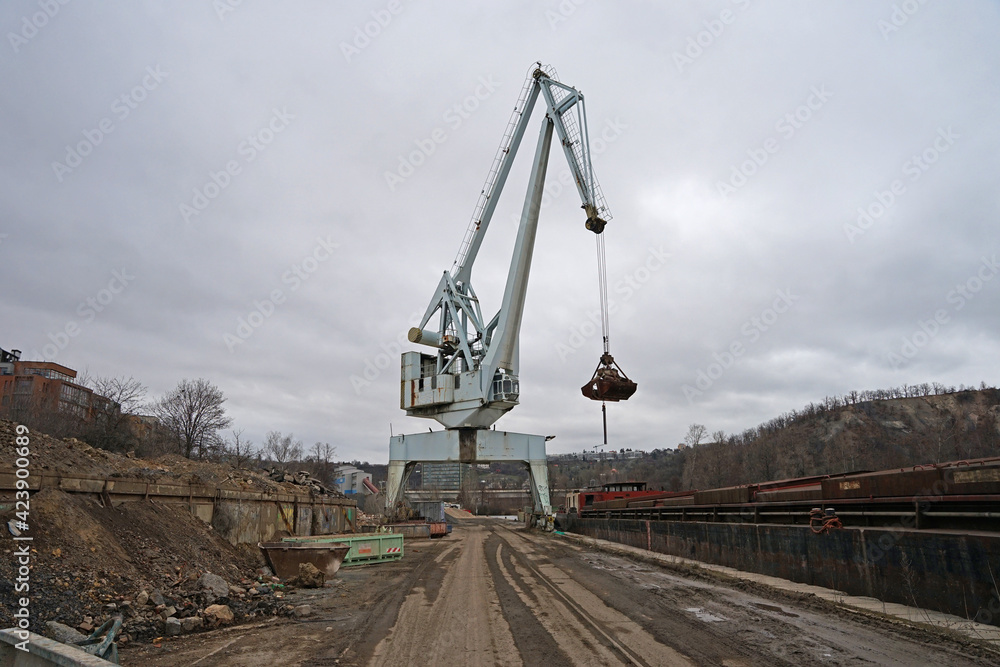 Historic crane for using for loading and unloading boats, industrial harbour in Holesovice, Prague, Czech Republic