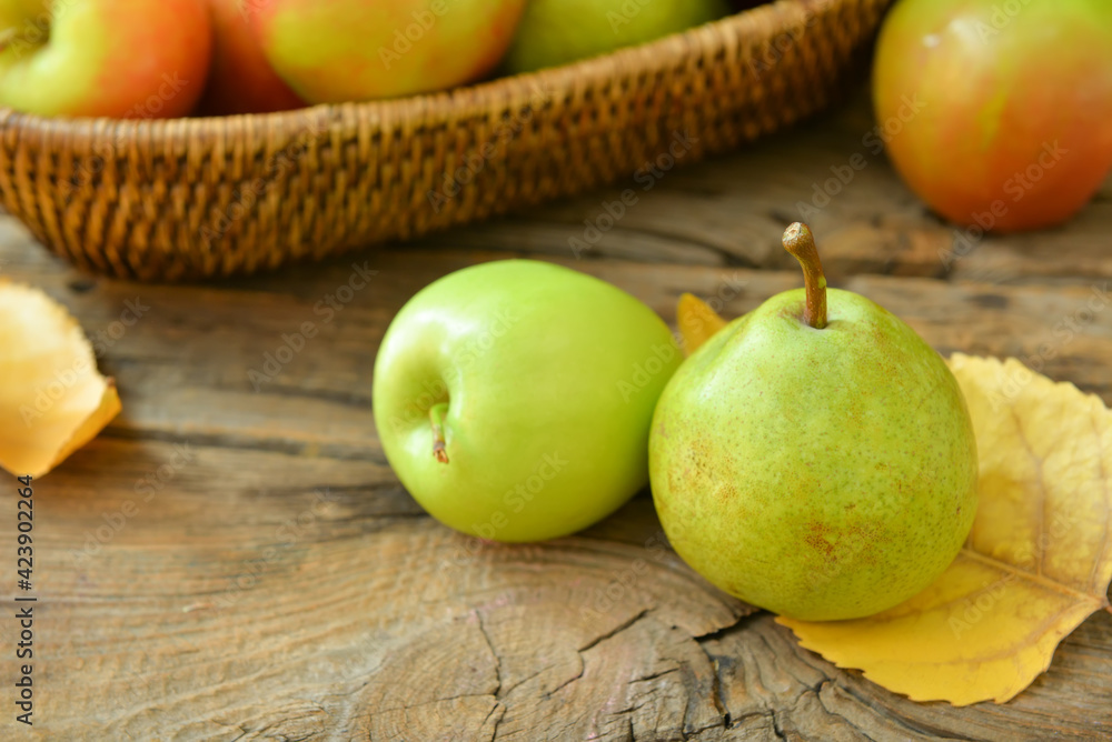 Tasty apple and pear fruits on table Tasty apple and pear fruits on table