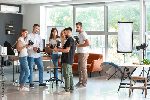 Mentor teaching young photo...