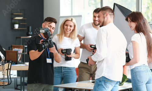 Mentor teaching young photo...