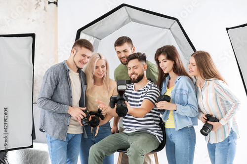 Mentor teaching young photo...