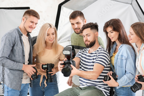Mentor teaching young photo...
