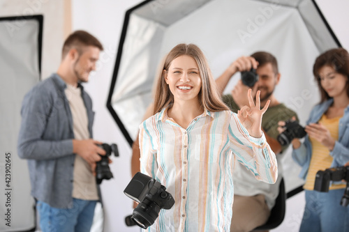 Portrait of female photogra...