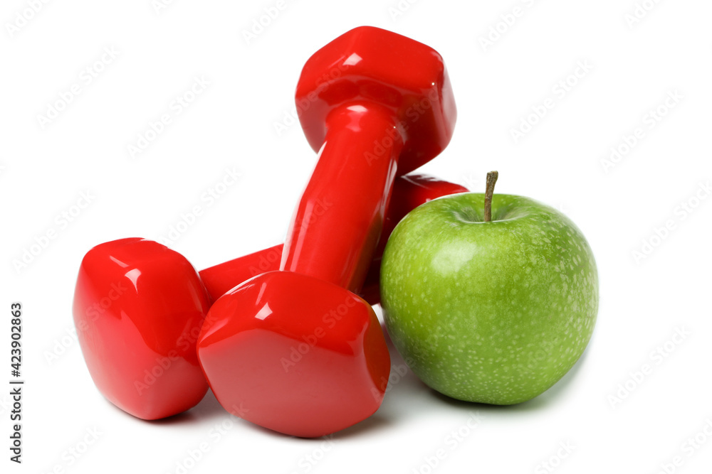 Dumbbells and apple isolated on white background Dumbbells and apple isolated on white background