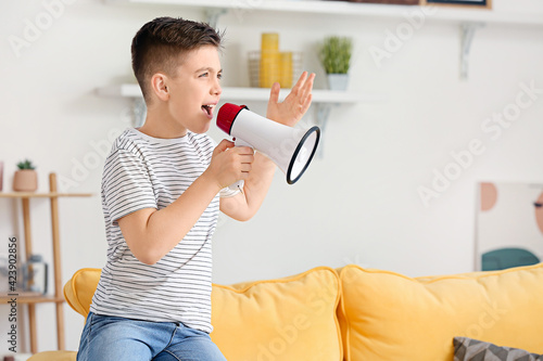 Screaming little boy with m...