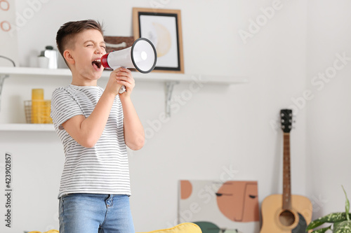 Screaming little boy with m...