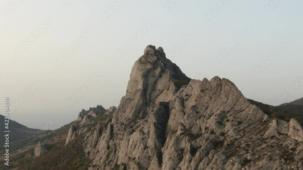 Aerial view of the majestic rock. Sunny autumn day. Aerial view of the majestic rock. Sunny autumn day.