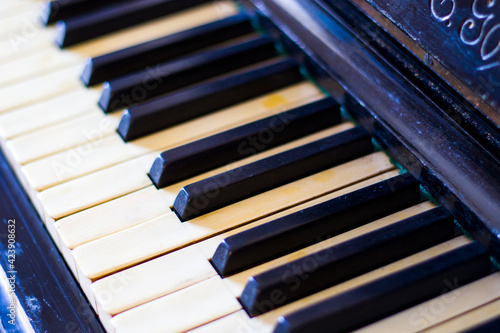 Wallpaper Mural Piano keyboard, black and white key, close-up and macro, retro and vintage piano Torontodigital.ca