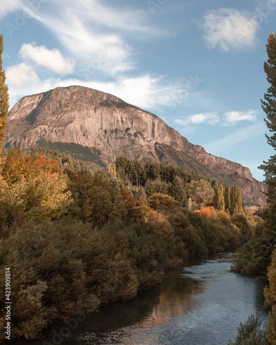 Ride next to big river on sunny day in autumn.