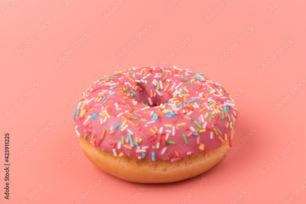 Fresh made Donuts isolated on pink background. Doughnuts are traditional sweet pastries. Copy space for text. Fresh made Donuts isolated on pink background. Doughnuts are traditional sweet pastries. Copy space for text.