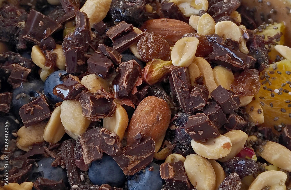 Smoothie bowl with chocolate nuts and fruits Smoothie bowl with chocolate nuts and fruits