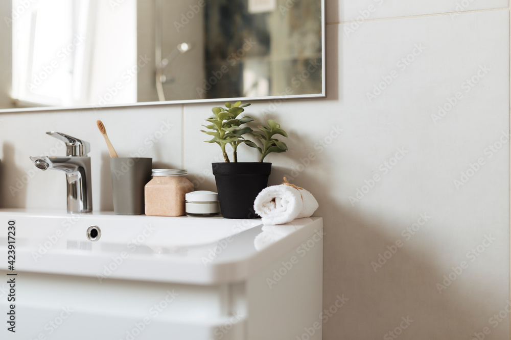 Fototapeta premium Washbasin in bathroom, bath accessories. Household, hotel cleaning concept