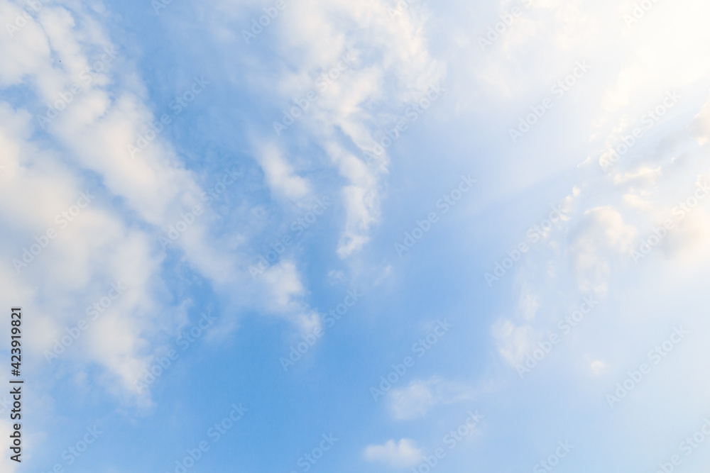 Fototapeta premium blue sky background with white clouds soft focus. creating a miraculous abstract shape.