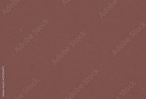 Recycled brown paper background with inclusions of small natural fibers. Extra large highly detailed image.
