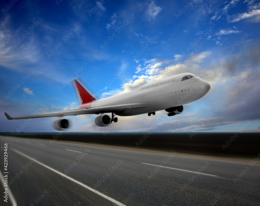 Modern white airplane landing on runway Modern white airplane landing on runway