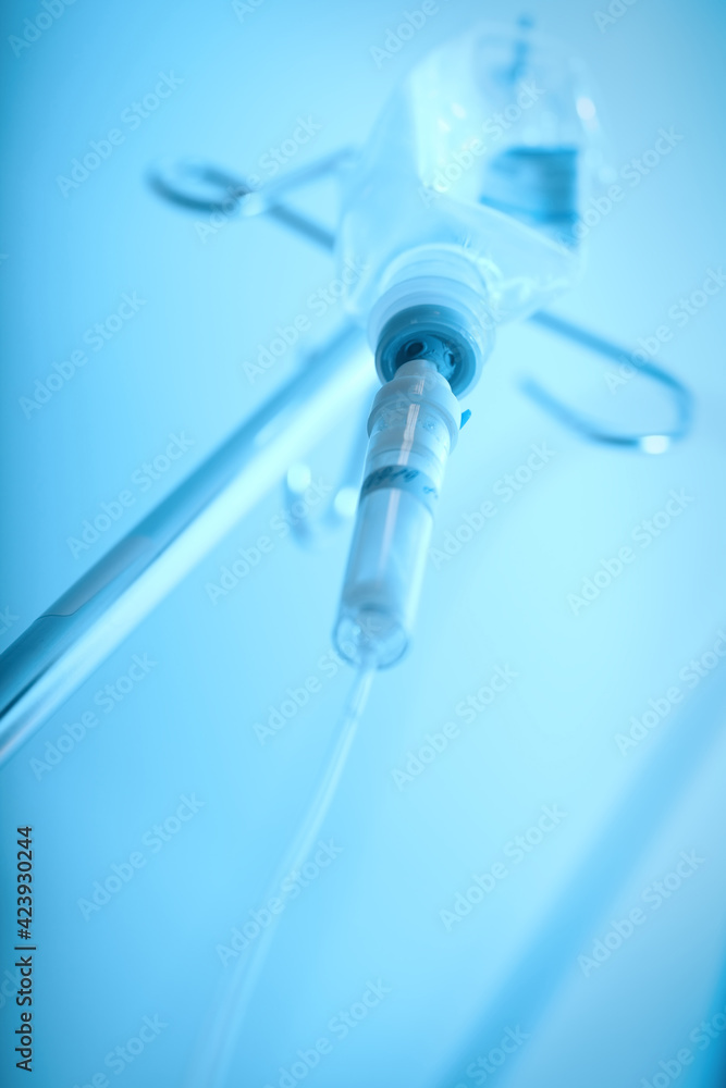 Saline drip in action in a patient emergency in an ICU Saline drip in action in a patient emergency in an ICU