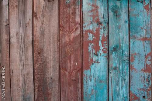 old painted wood texture. boards with cracks and nails driven in.
