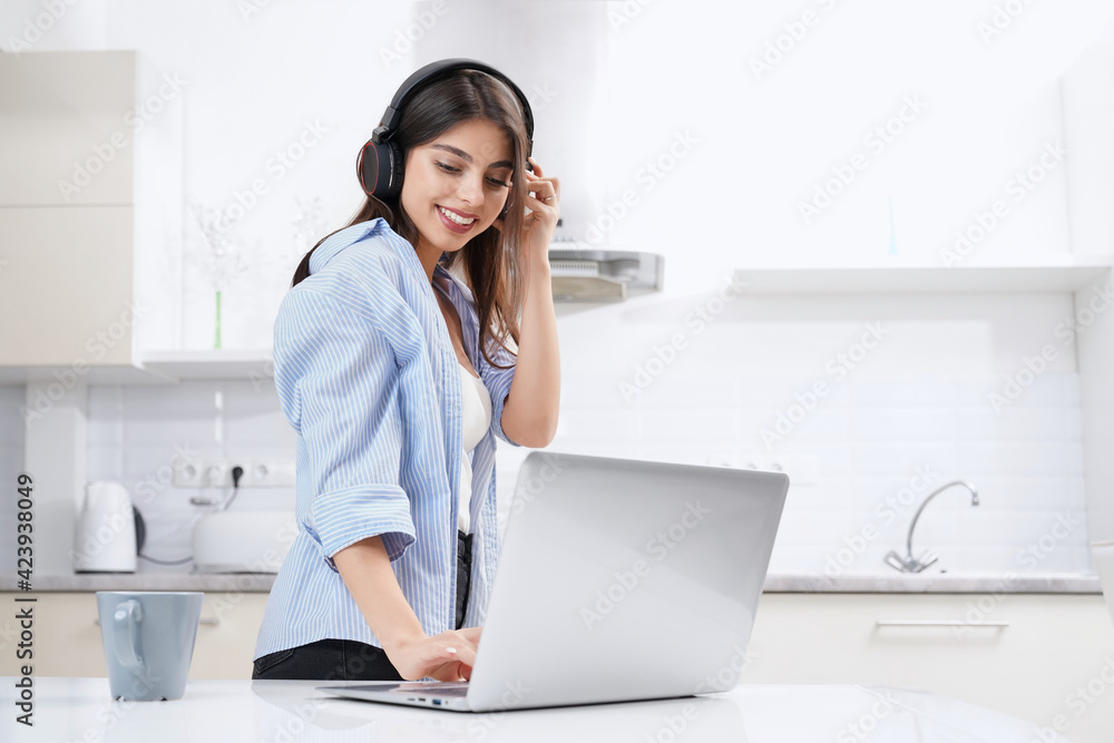 Beautiful woman working or studying at home.
