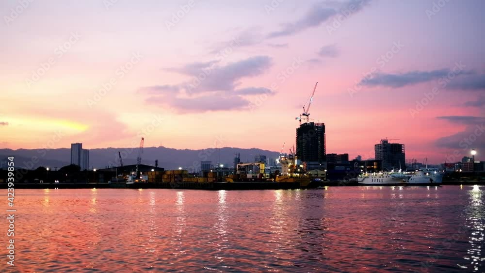 Approaching Cebu City international seaport at dusk. Approaching Cebu City international seaport at dusk.