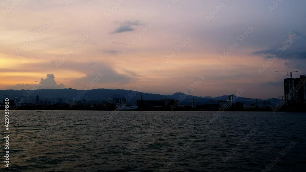 Approaching Cebu City international seaport at dusk. Approaching Cebu City international seaport at dusk.