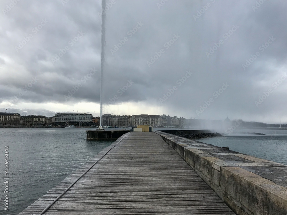 Geneva, Switzerland; 01 28 2019: views of Lake Leman and the jet d'eau in Geneva. Geneva, Switzerland; 01 28 2019: views of Lake Leman and the jet d'eau in Geneva.