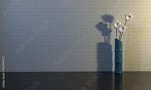A blue vase with artificial white flowers on the table. The shadow of the vase falls on the walls. Postcard. Place for recordings
