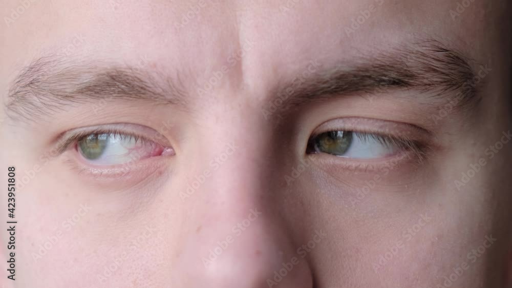 Gymnastics for the eyes. Man doing vision training exercise Gymnastics for the eyes. Man doing vision training exercise