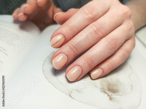 Female hands with nail design. Manicure and Hands Spa. . Beauty treatment. Beautiful woman s nails with beautiful baby boomer manicure copy space for. Manicured nails and Soft hands skin . Closeup