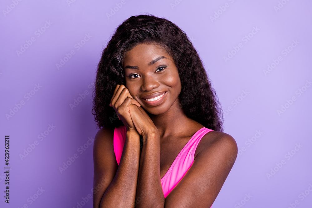 Photo of young african girl happy positive smile hands together grateful pleased isolated over violet color background Photo of young african girl happy positive smile hands together grateful pleased isolated over violet color background