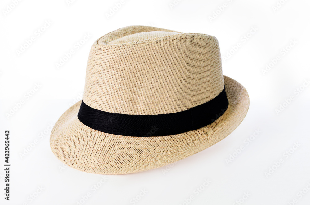 Panama style hat. Straw material with black fabric tape. Isolated on white background. Panama style hat. Straw material with black fabric tape. Isolated on white background.