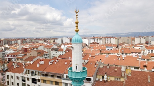 aerial view of city ​​mosque between the buildings