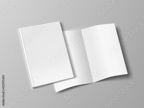 Two Thin Books Open And Close With Soft Cover