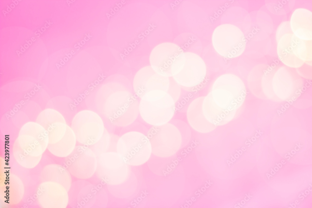 strip of defocused white lights on pink background strip of defocused white lights on pink background