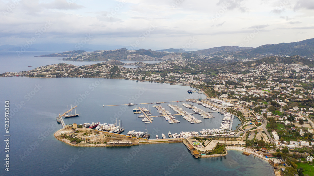 A large body of water with a city in the background