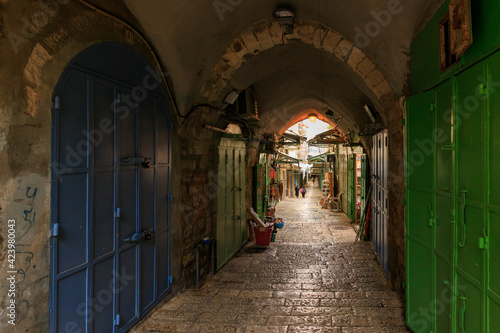 Several open shops on Daniel Street Arab market on a rainy day near the Yafo Gate in the old city of Jerusalem, in Israel
