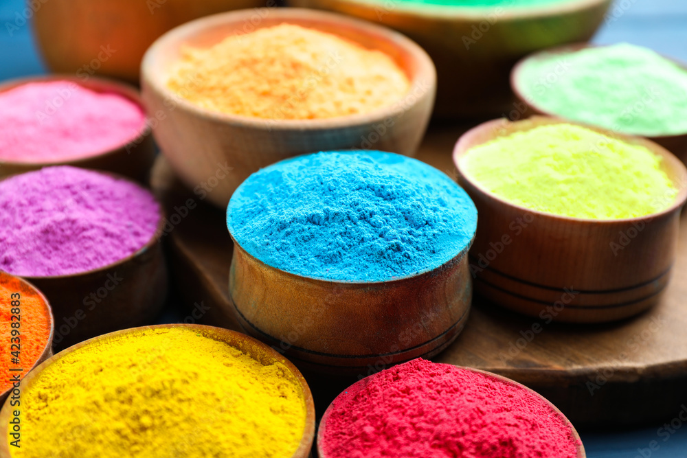 Colorful powder dyes as background, closeup. Holi festival Colorful powder dyes as background, closeup. Holi festival