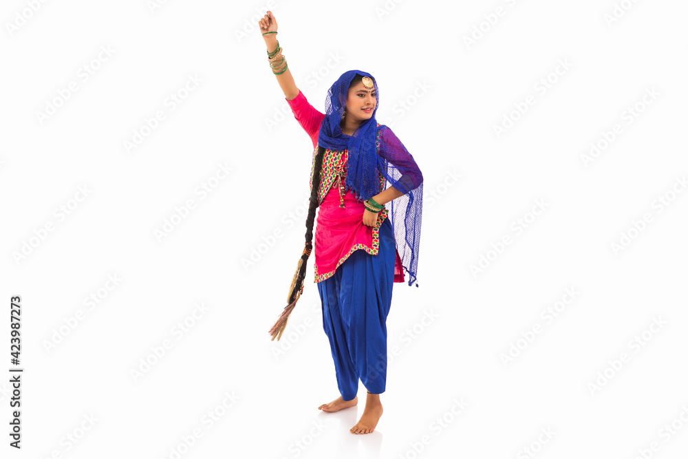 A Giddha dancer performing a Dance step.	