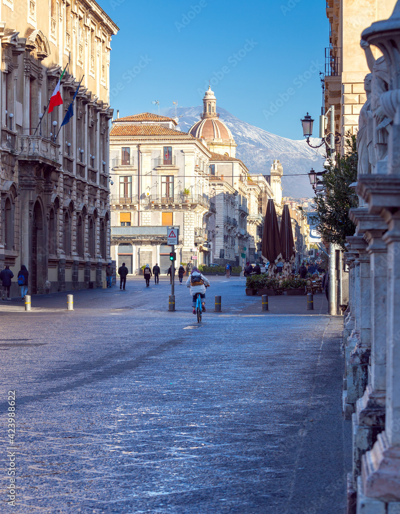 Street in the historic part of the old city in the early morning. Catania. Italy.