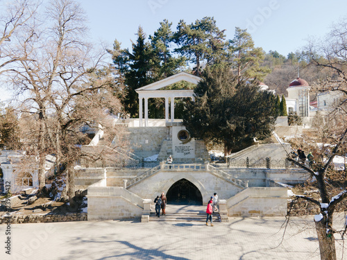 Aerial view of Kislovodsk with narzan gallery and monument for Lermontov in sunny day, heath and ecological resotrt in Russia near Caucasus mountains photo